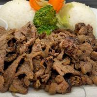 Beef Teriyaki · Served with steamed rice and salad.