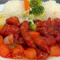 Sweet & Sour Chicken · Served with steamed rice and salad.