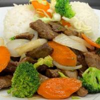 Beef Broccoli · Served with steamed rice and salad.