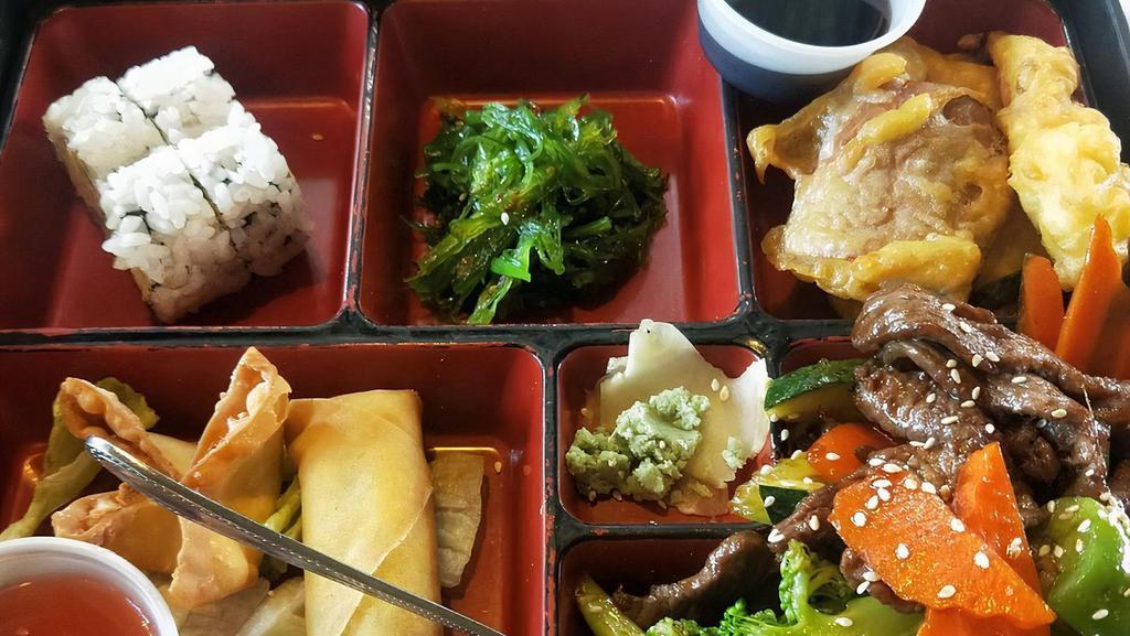 Teriyaki Bento Box · Served with steamed rice, seaweed salad, California roll, tempura, egg roll and cheese wonton.