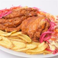 Pollo Con Tajadas · Chicken breast, plantain, cabbage, onion, and sauce.
