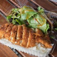 Thai Katsu Chicken · Crispy and crunchy breaded chicken cutlet served with sweet and sour sauce over white jasmin...