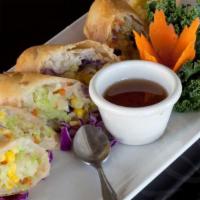 Veggie Spring Rolls (3 Rolls) · Crispy fried veggie rolls filled with delicate glass noodles, cabbage, carrot, and corn. Pai...