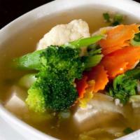 Tofu & Veggie Soup · Gluten-free. Diced tofu in a clear vegetable broth cooked with carrot, green onion, cabbage,...