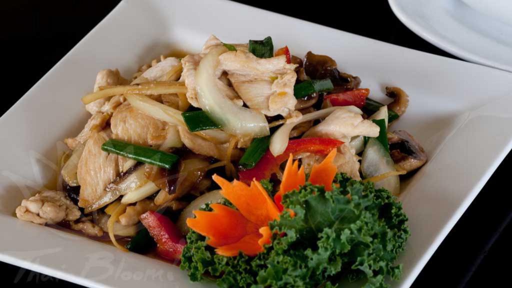 Ginger Chicken · Tender chicken breast sliced and stir fried with flavors of ginger and garlic, diced mushroom, bell pepper, and white onion.