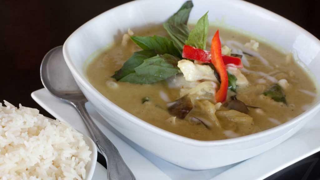 Green Curry 🌶🌶 (Due To Supply Shortage This Dish Will Not Have Coconut Meat) · Gluten-free, medium spicy. Classic coconut milk based green curry with young coconut meat, eggplant, bell pepper, bamboo shoot, green bean, and fresh basil.