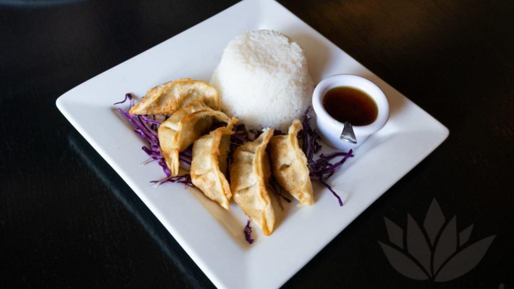 Kids' Chicken Pot Stickers (5 Pieces) · A kid favorite - crispy potstickers with chicken, onions, and garlic. Served with plum sauce and white jasmine rice.