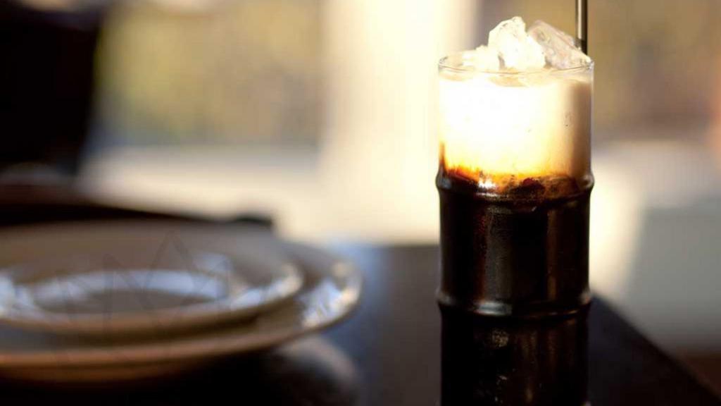 Thai Iced Coffee (20 Oz.) · A bold, strongly brewed and sweetened Thai-style coffee topped with cream.