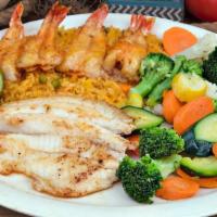 Acapulco Plate · Grilled tilapia filet and butterfly style shrimp. Served with steamed California veggies and...