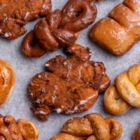 Specialty Dozen · Apple Fritters, Bear Claws, Cinnamon Rolls, Rosettes, Knots and Pine Cones.