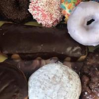 Specialty Half Dozen · Apple Fritters, Bear Claws, Cinnamon Rolls, Rosettes, Knots and Pine Cones.