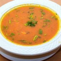 Mulligatawny Soup · A rich chicken, lentil, and rice soup flavored with Indian spices and finished with a hint o...