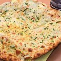 Paneer Nan · Leavened bread stuffed with traditional Indian homemade cheese.