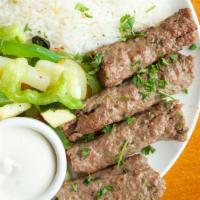 Keema Kabab · Ground beef with onions and fresh herbs. Served with basmati rice, fresh sauteed vegetables,...