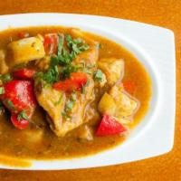 Jalfrazie Chicken · Boneless chicken stir-fried in brown curry with bell peppers, garlic, ginger, tomatoes, and ...