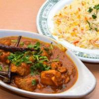Madras Chili Masala Beef · The dish originates from the city of Madras. Cooked in a sauce of tomatoes, roasted dry chil...
