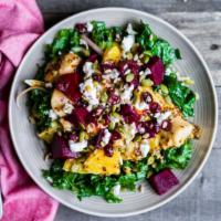 Beet Salad · Organic mixed greens tossed with fresh beets, carrots, raisins, and red cabbage drizzled wit...