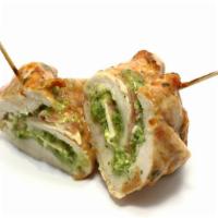 Chicken Pesto Wrap · Grilled chicken breast, fresh pesto, fresh Mozzarella cheese, tomatoes, and organic mixed gr...
