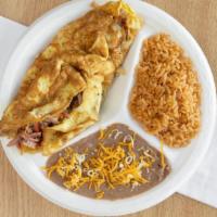 Spanish Omelette · Served with a tortilla, rice and beans.
