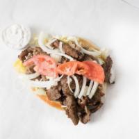 Gyros · Very, very tasty! sliced, special seasoned meat, onions, tomatoes, gyro sauce.