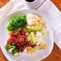 Ahi Tuna Poke Bowl · Ahi tuna, avocado, wakame salad, cucumber, sushi rice, scallion.
