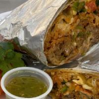 Burrito · Large flour tortilla served with pinto beans, rice, your choice of meat,  pico de gallo, che...