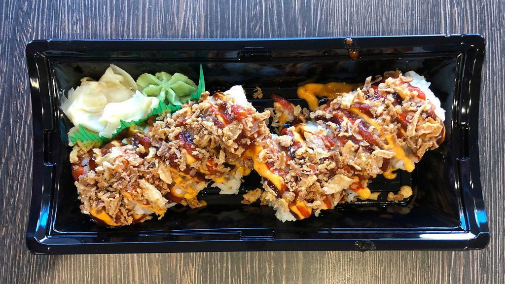 Hot & Crunchy (10 Pc) · Spicy Crab Salad, Cucumber, Avocado and Jalapeno rolled in Seaweed with Sushi Rice. Topped with Fried Onions, Spicy Mayo & Sriracha Sauce.
