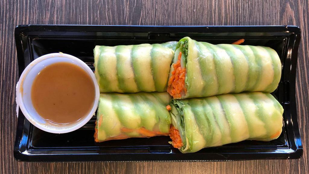 Avocado Spring Roll · Avocado, Cucumber, Carrot & Green Leaf Lettuce rolled in Rice Paper. Served with Pineapple-Peanut Sauce.