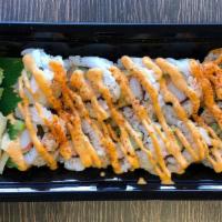 Spicy California Roll (10 Pc) · Spicy Imitation Crab, Cucumber & Avocado rolled in Seaweed with Sushi Rice. Coated with Sesa...