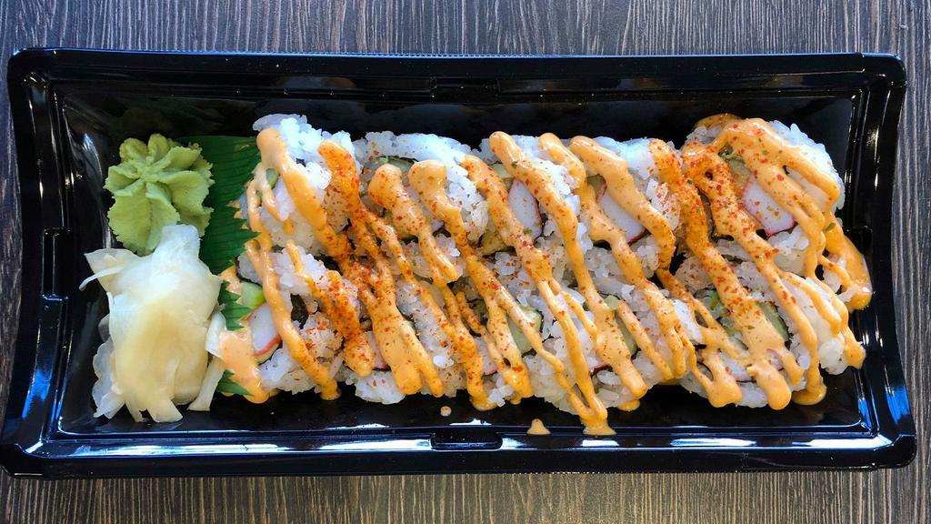 Spicy California Roll (10 Pc) · Spicy Imitation Crab, Cucumber & Avocado rolled in Seaweed with Sushi Rice. Coated with Sesame Seeds.