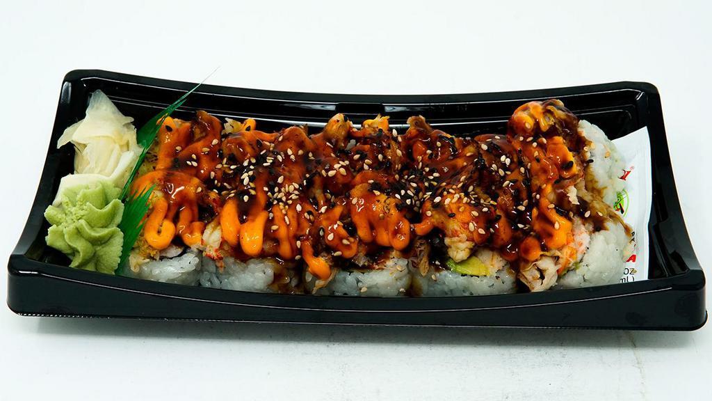 Louisiana Roll (10 Pc) · Imitation crab salad, avocado and cucumber rolled in seaweed and sushi rice. Topped with torched crawfish, Yummi Spicy Mayo, Yummi Sushi Sauce and sesame seeds.