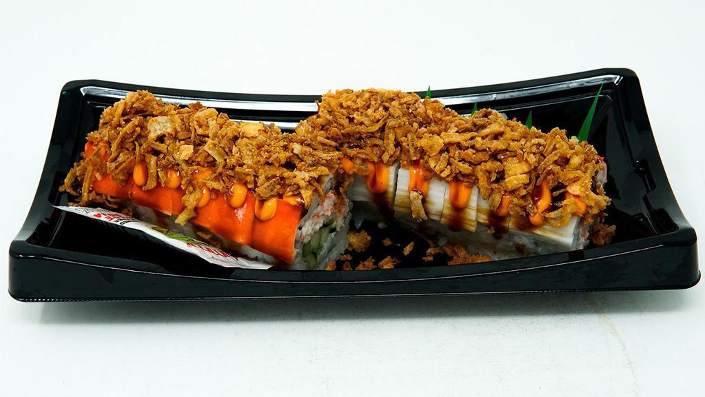 Ninja Roll (10 Pc) · Imitation crab salad and cucumber rolled in seaweed and sushi rice. Topped with shredded imitation crab stick Yummi Spicy Mayo, Yummi Sushi Sauce and finished with fried onions.
