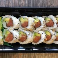 Spicy Tuna Roll · Spicy Tuna, Cucumber & Avocado rolled in Seaweed with Sushi Rice. Coated with Sesame Seeds.