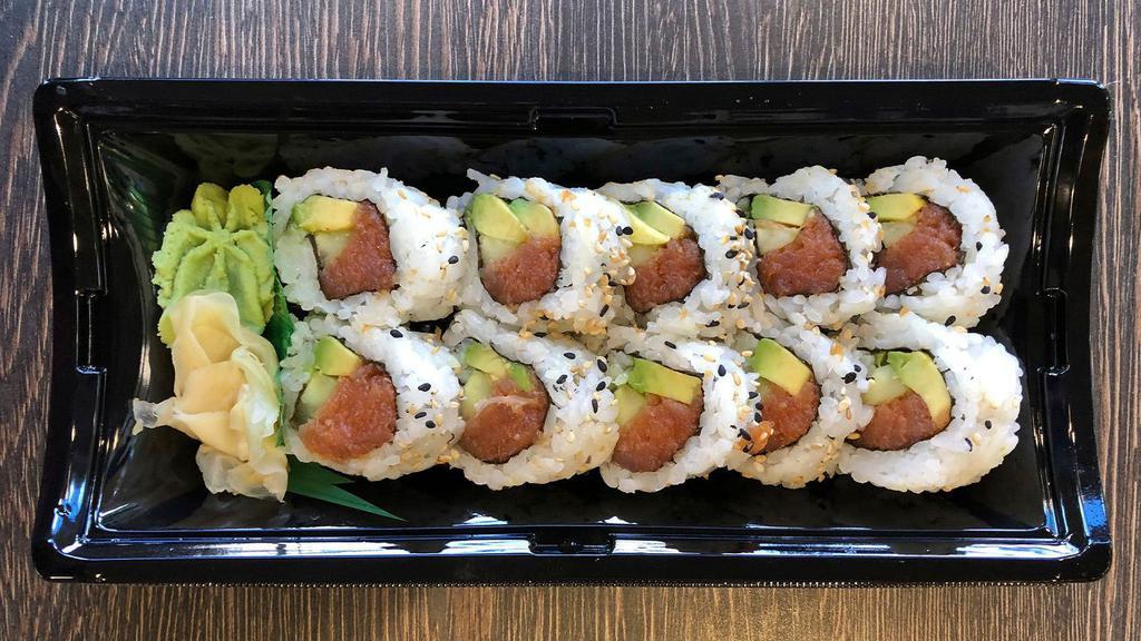 Spicy Tuna Roll (10 Pc) · Spicy Tuna, Cucumber & Avocado rolled in Seaweed with Sushi Rice. Coated with Sesame Seeds