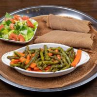 Carrot & Fosolia · Strips of carrot and green beans sautéed with onion, garlic and berbere.