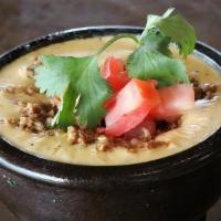 Chile Con Queso · Traditional & Mexican Cheeses / Handmade Salsa / GFA / Add Seasoned Ground Beef or Chorizo +...