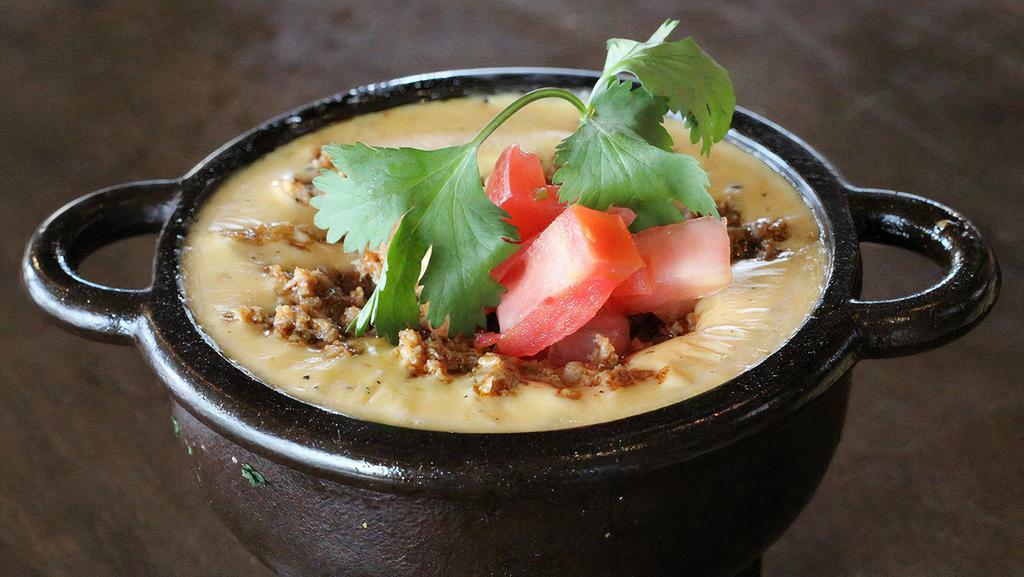 Chile Con Queso · Traditional & Mexican Cheeses / Handmade Salsa / GFA / Add Seasoned Ground Beef or Chorizo +1.5