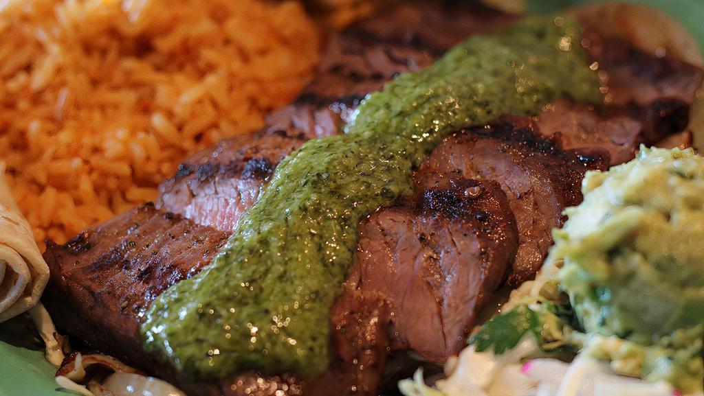Carne Asada * · Grilled Marinated Skirt Steak / Cilantro Chimichurri / Caramelized Onions / Guacamole / Fresh Flour Tortillas / Spanish Rice / Refried Beans.

*Consuming raw or undercooked meats, poultry, shellfish or eggs may increase risk of foodborne disease.