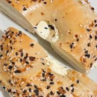 Bagel & Schmear · A fresh homemade bagel, toasted and generously schmeared with cream cheese!