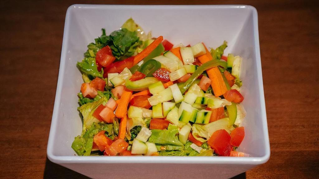Large Tossed Salad · Mixed salad greens with tomato, cucumber, onion, green pepper, olives and  your choice of dressing