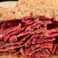 Hot Corned Beef · The Classic! Zaidy's corned beef, seeded rye bread and a side dish of your choice