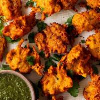 Mixed Vegetable Pakora · Mixed vegetables fritters fried in a chickpea batter.