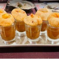 Pani Puri · 6 round, hollow, and fried crisp puri filled with a mixture of flavoured water.