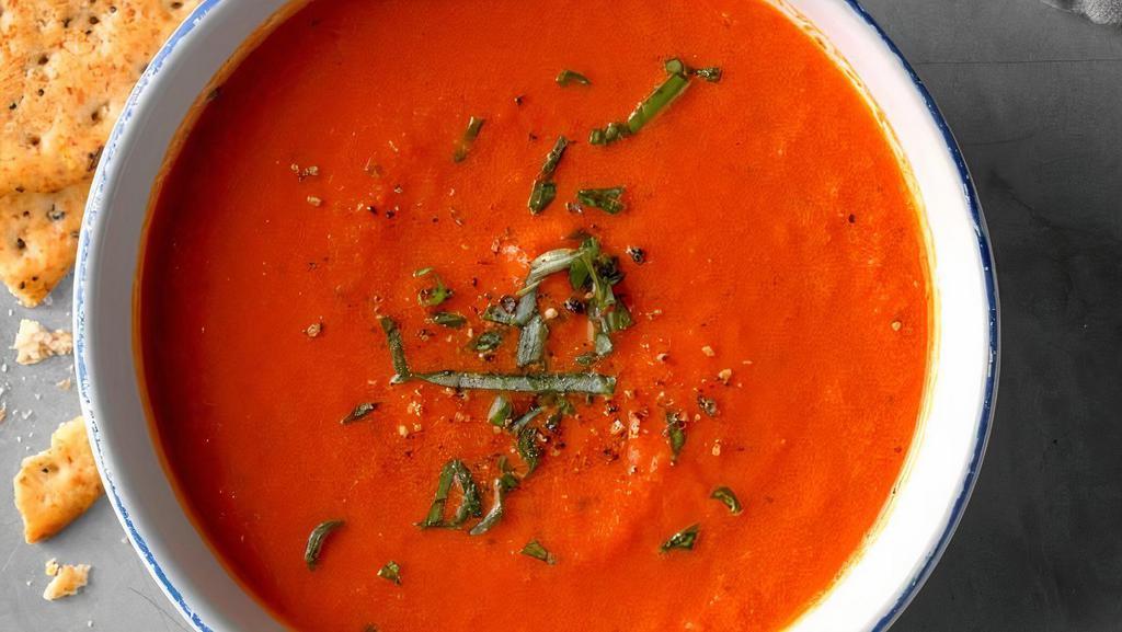 Tomato Soup · Traditional tomato soup flavored with herbs and spices.