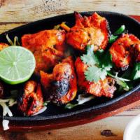 Chicken Tikka Full · Tender chunks of boneless chicken seasoned with heavenly spices and barbecued in a tradition...