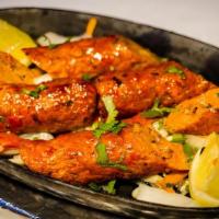 Seekh Kebab Full · Minced lamb marinated in herbs and charcoal grilled on a skewer.