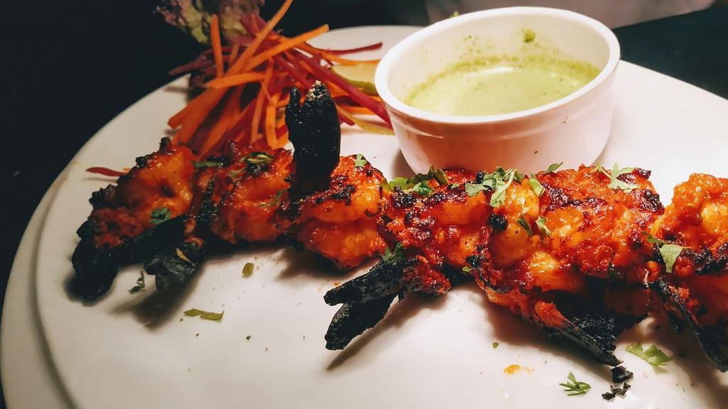 Shrimp Tandoori · Barbecued shrimp with a subtle taste of Indian spices.