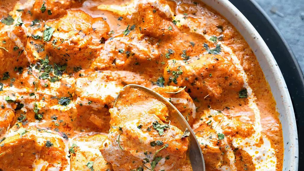 Butter Chicken · Grilled chicken marinated with yogurt and spices cooked in a creamy curry sauce. Basically a dark meat chicken tikka masala. Served with basmati rice.