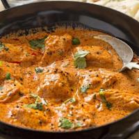 Korma · Braised in spiced sauce made with yogurt, cream, and nut paste.