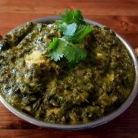 Saag Paneer · Vegetarian. Cheese and spinach sautéed with a touch of cream. Served with basmati rice.
